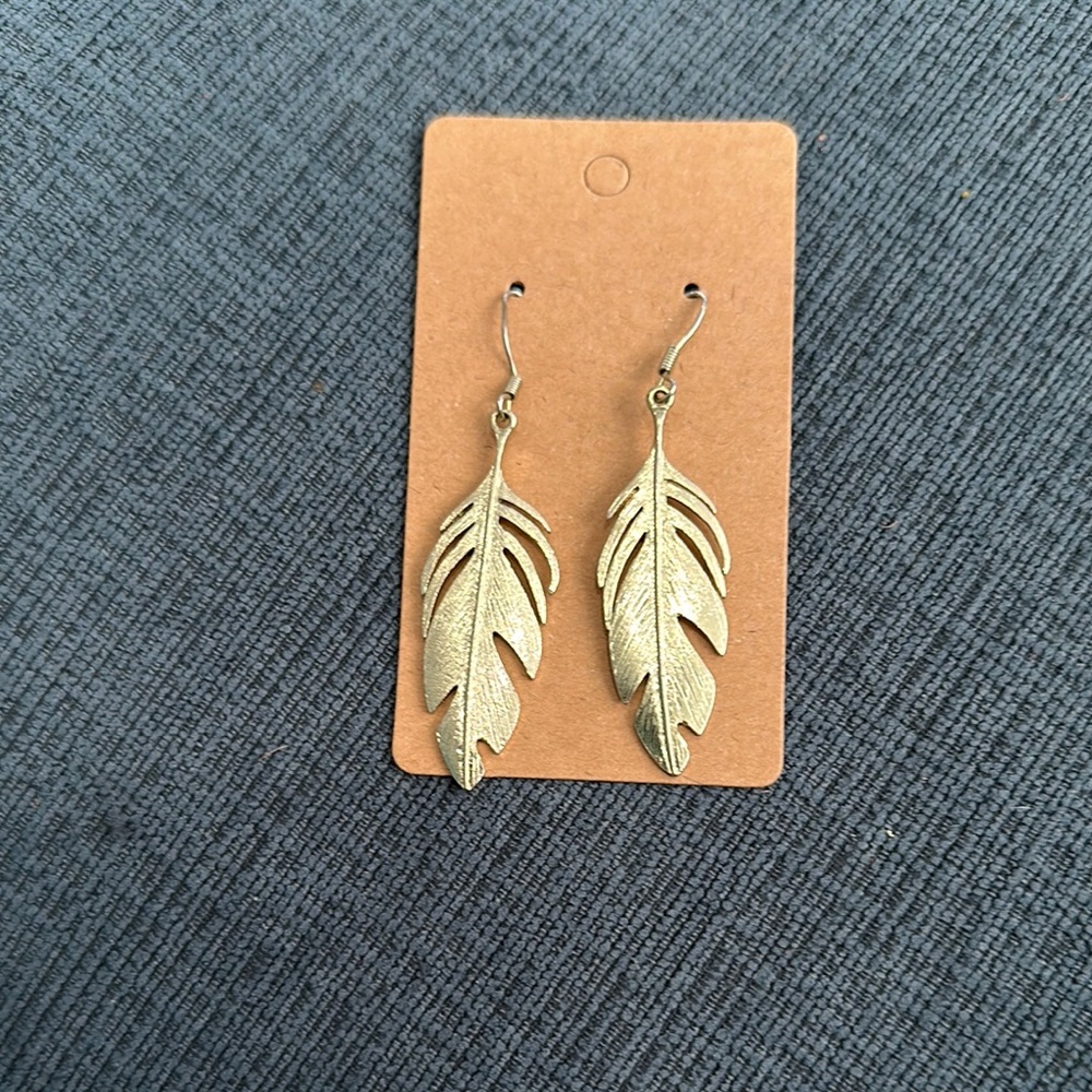 Gold tone leaf earrings